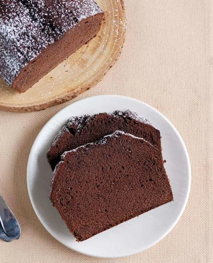 two slices of chocolate pound cake on a plate