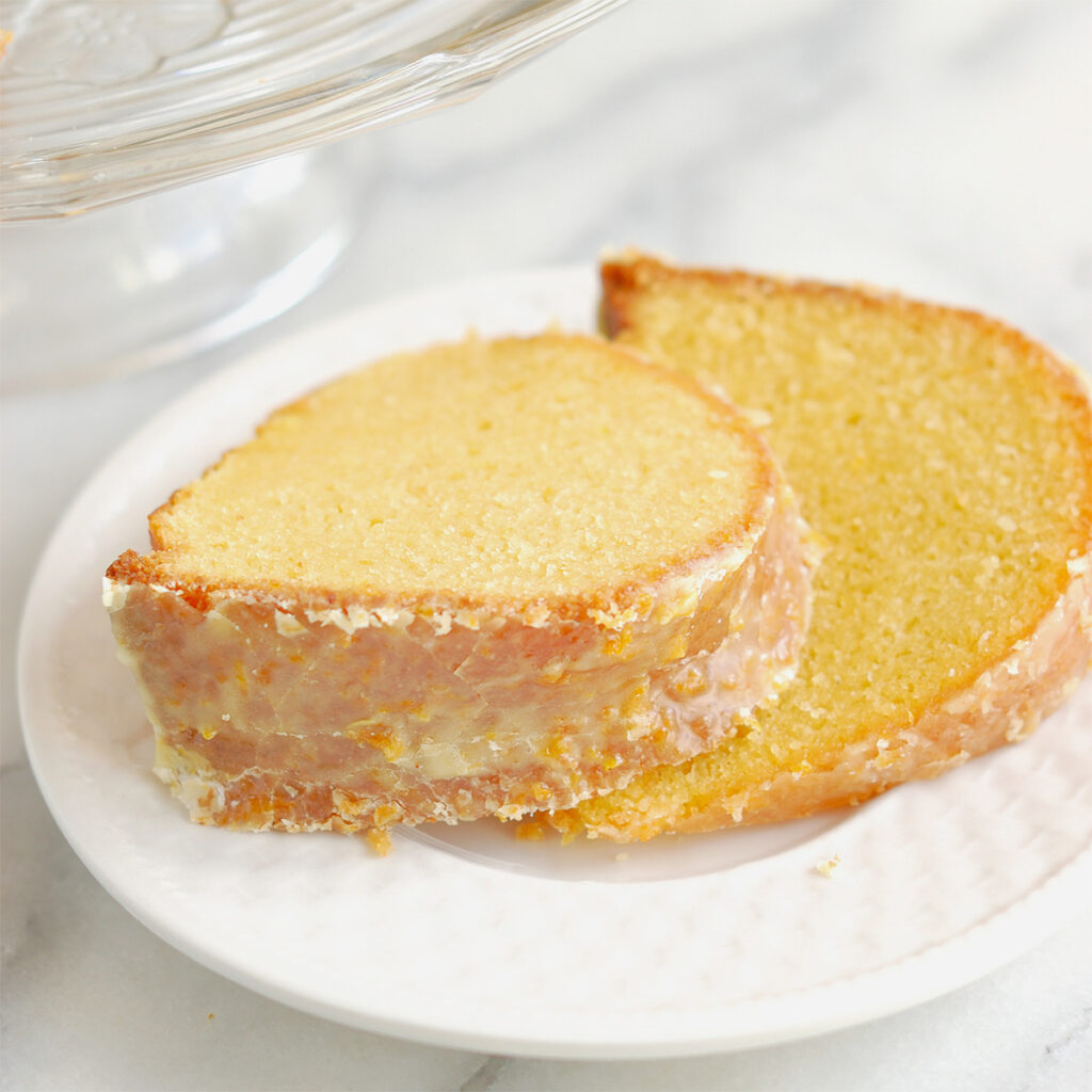 two slices of beet cake on a white plate.