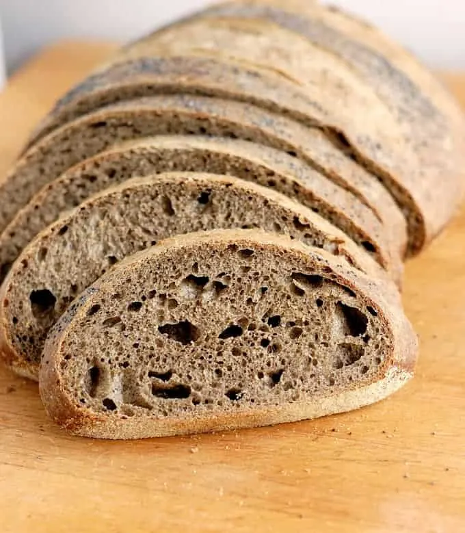 guinness buckwheat bread sliced on a cutting board