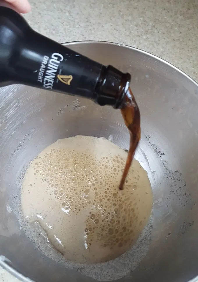 adding guinness to bread dough