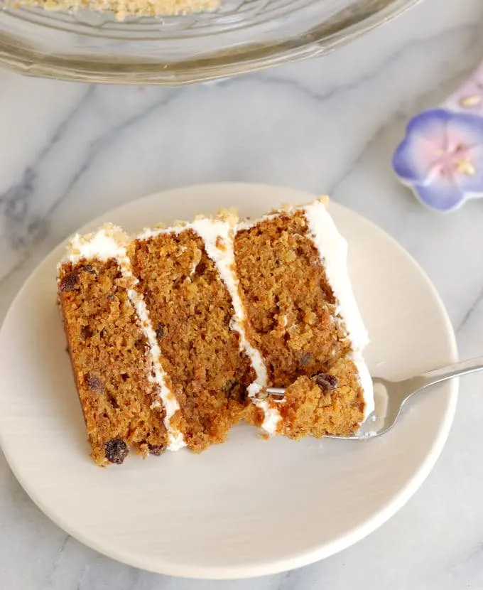 a slice of carrot cake on a plate