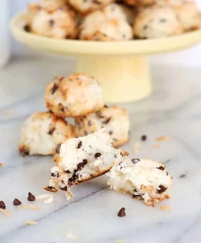a broken coconut macaroon with chocolate chips