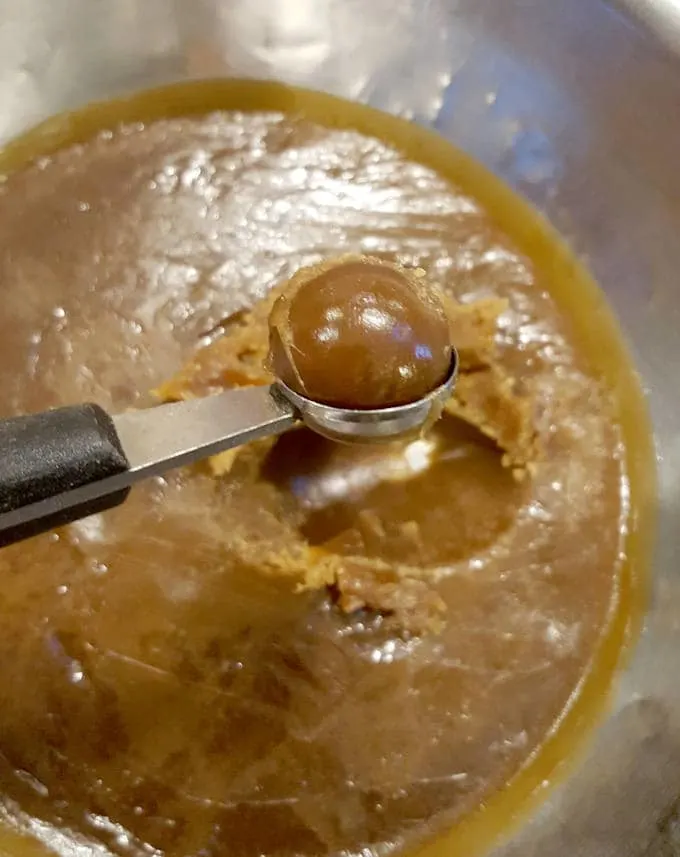 scooping butterscotch with a melon baller