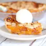 a slice of apricot raspberry pie