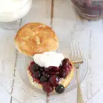 a blueberry & cherry shortcake on a plate