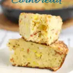 two pieces of smoked cornbread on a plate with text overlay for pinterest