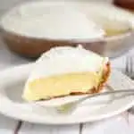 a slice of margarita pie on a white plate with a fork