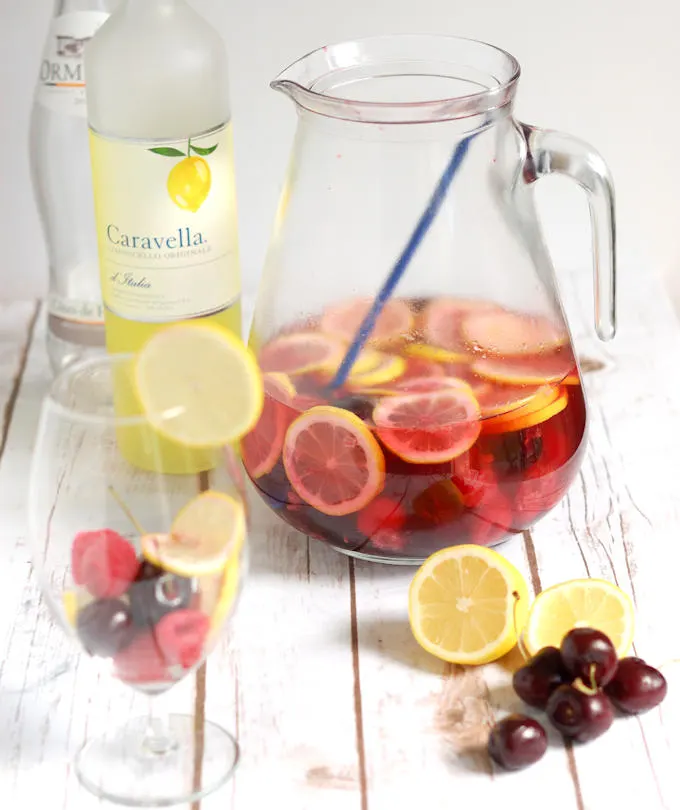 a jug of pink lemonade sangria 