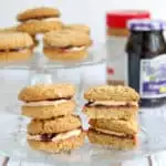 Peanut butter & jelly sandwich cookies on a plate