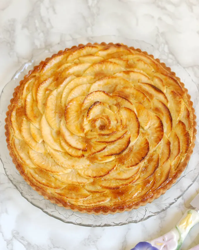 a Apple Frangipane Tart on a glass plate