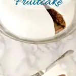 a pinterest image of a brandy aged fruitcake with text overlay