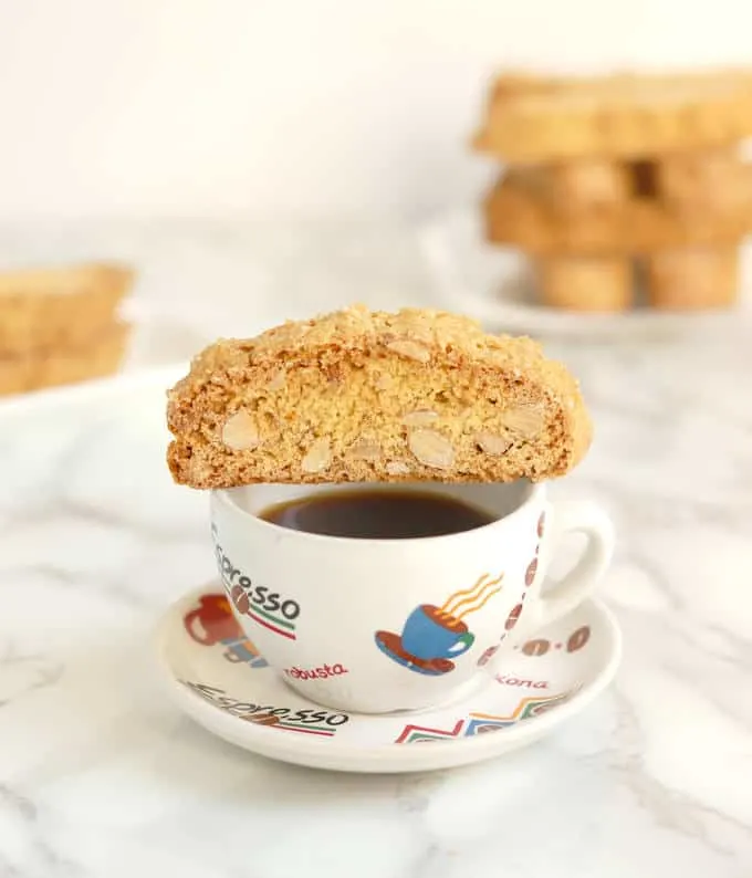 a Anise & Orange Biscotti on a cup of espresso