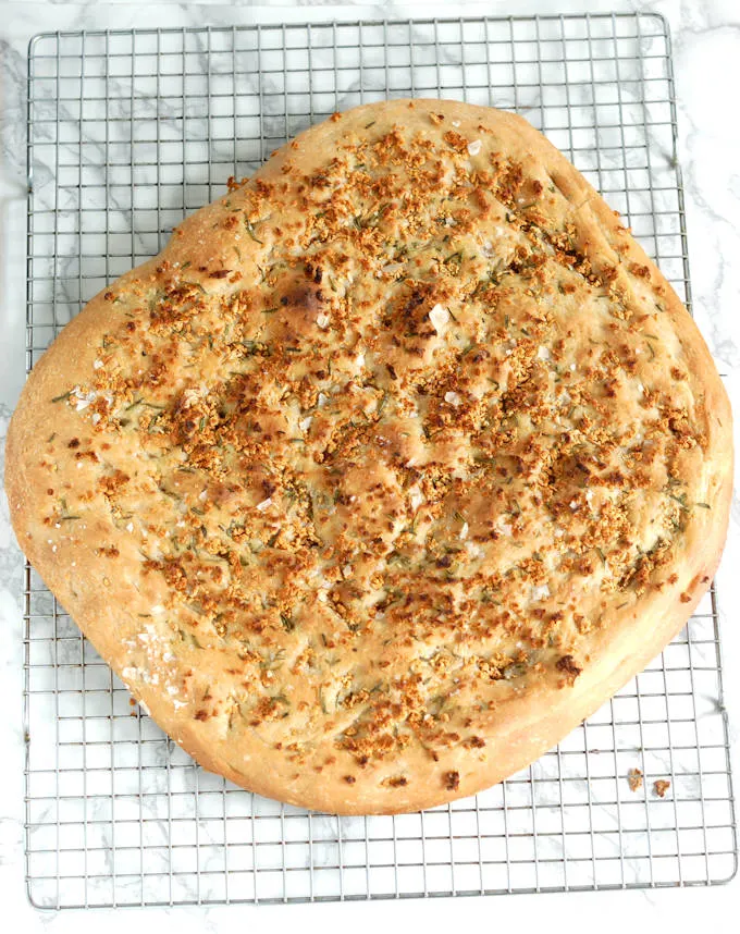 sourdough focaccia on a cooling rack