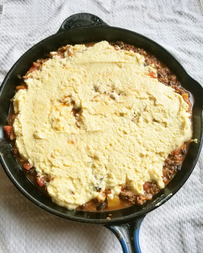 Chili Cornbread Cobbler in a cast iron skillet