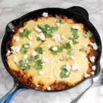 Chili Cornbread Cobbler in a cast iron skillet