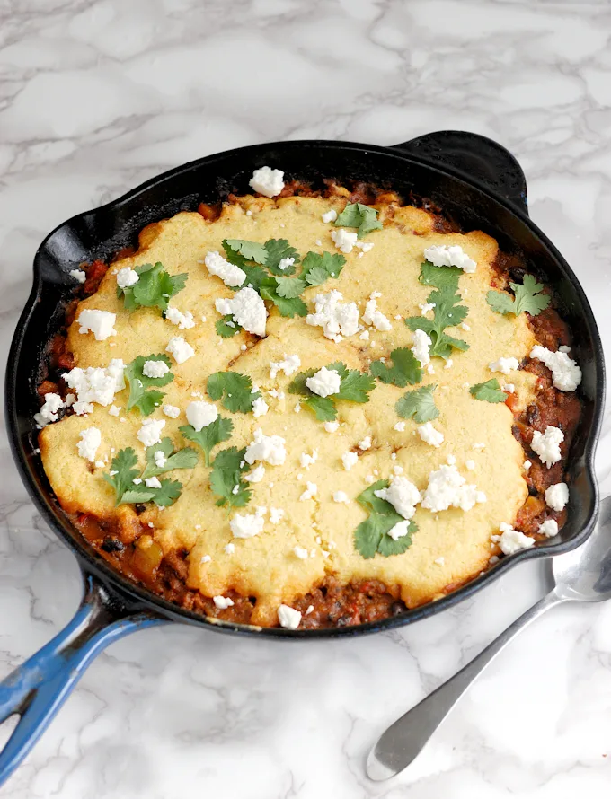 Chili Cornbread Cobbler in a cast iron skillet