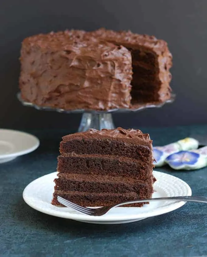 a slice of old fashioned chocolate cake on a plate