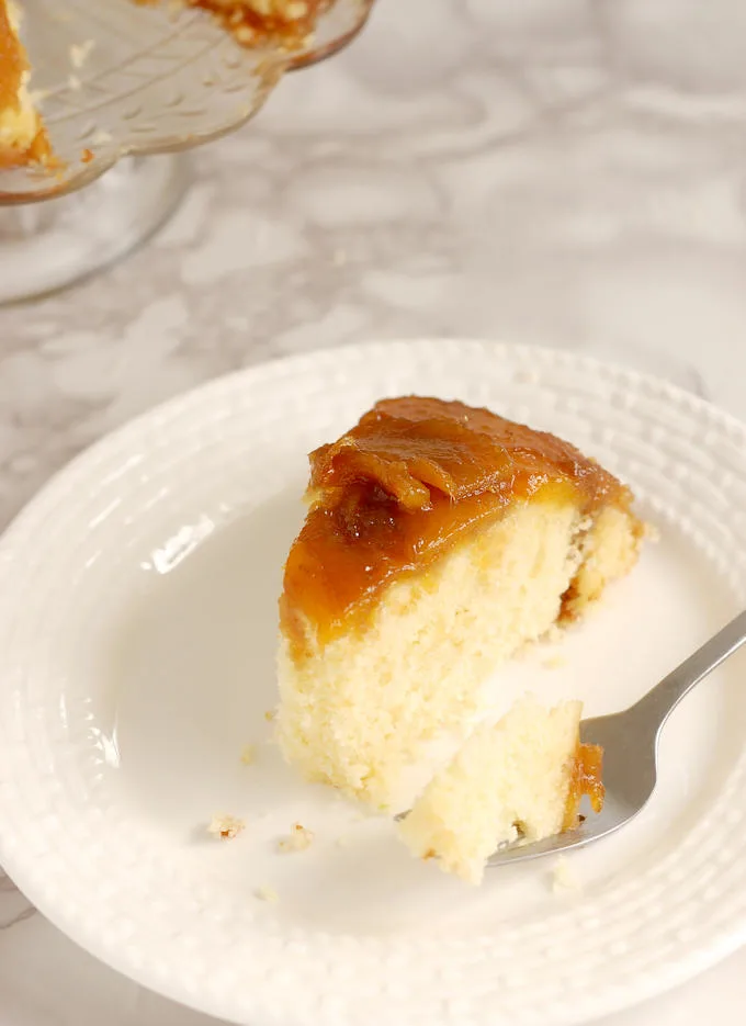 a partially eaten slice of Mango Upside Down Cake