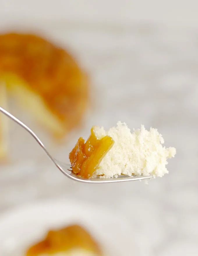 a bite of Mango Upside Down Cake on a fork
