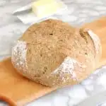 a loaf of whole grain low knead bread