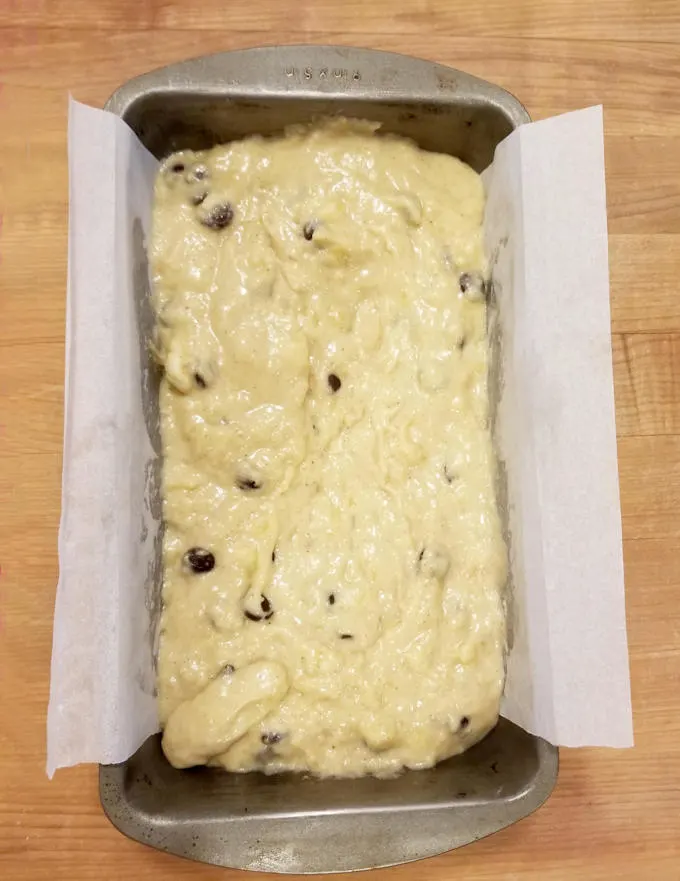 banana bread batter in a loaf pan