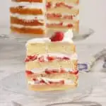 a slice of strawberry tall cake