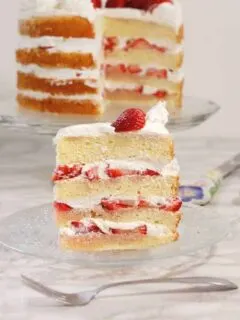 a slice of strawberry tall cake