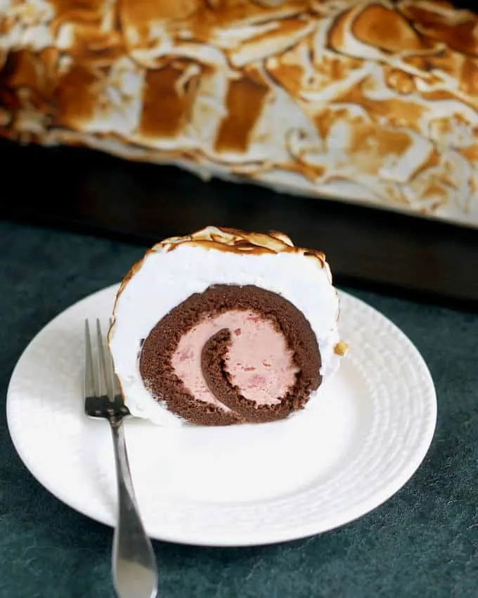a slice of baked alaska cake roll