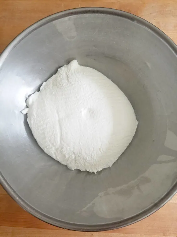 drained yogurt in a bowl