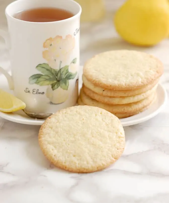 lemon thin cookies and a cup of tea