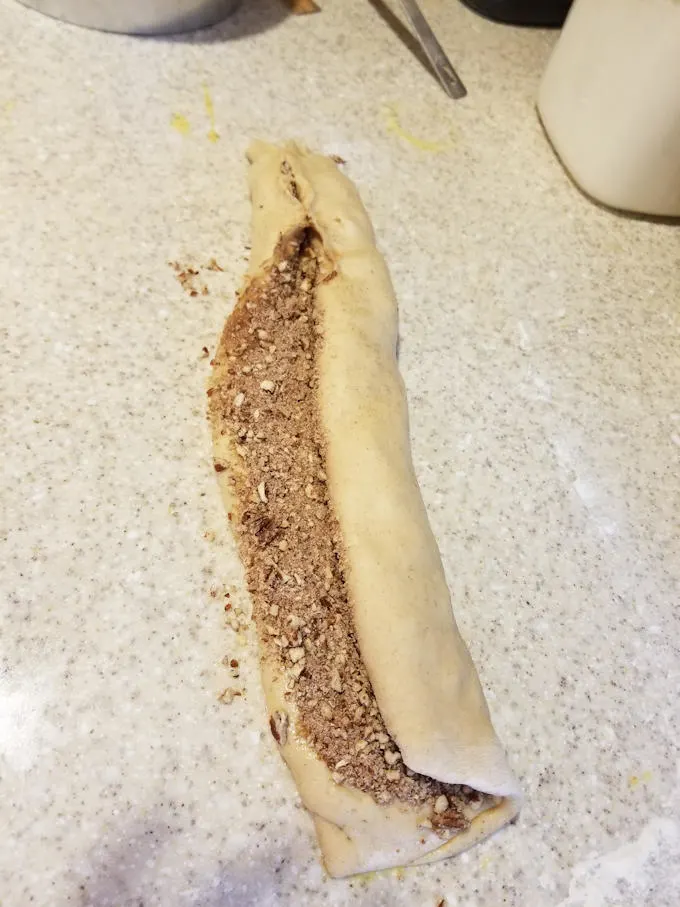 rolling streusel into a coffee cake