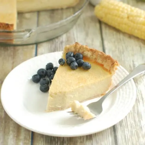 Sweet Corn Buttermilk Pie served with fresh blueberries
