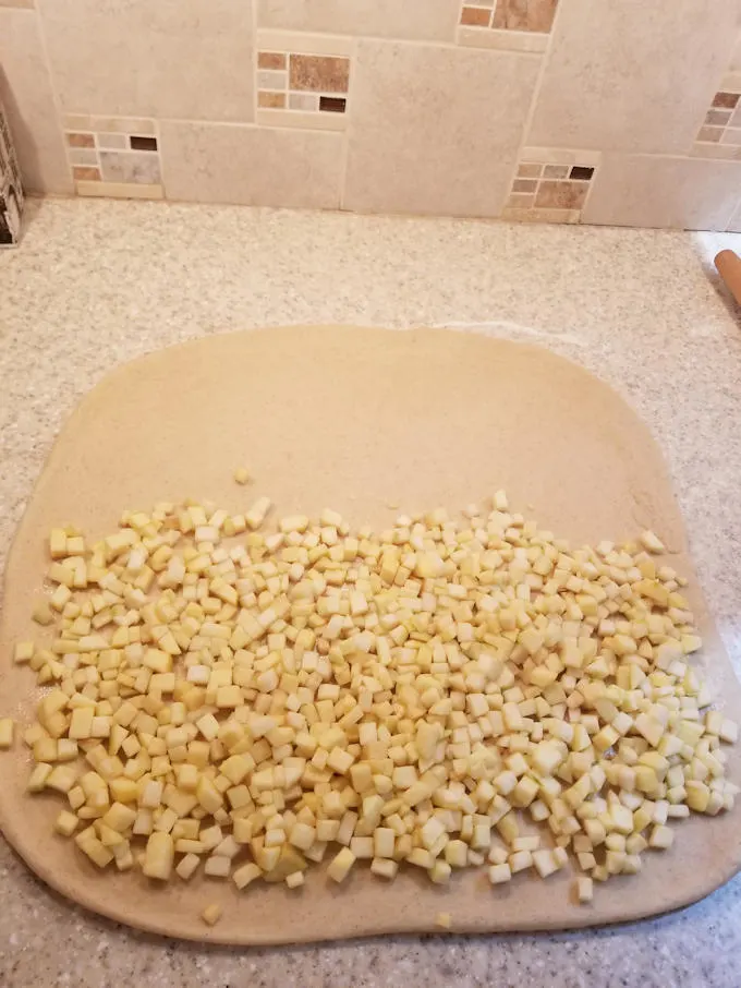 fold the apples into the bread dough