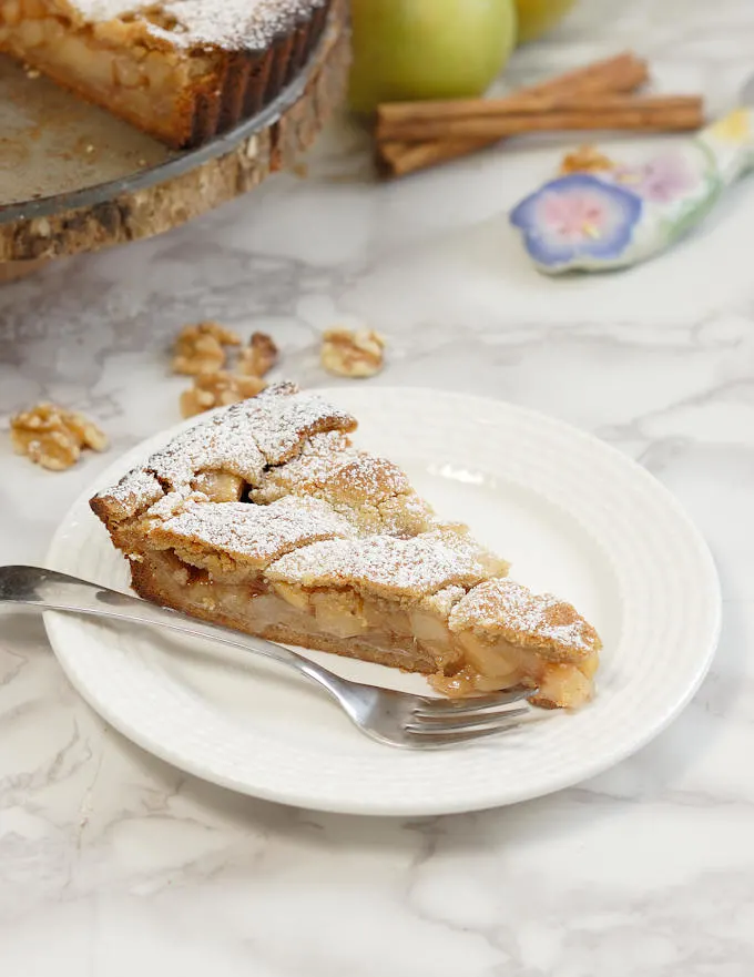 a slice of apple walnut linzer tart