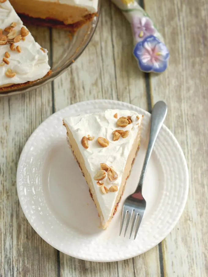 A slice of peanut butter mousse pie on a plate
