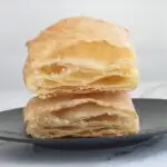 a cross section of baked puff pastry showing layers.