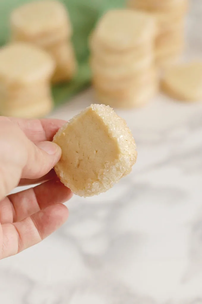 a hand holding a diamant sable cookie