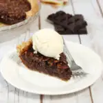 chocolate bourbon pecan pie with vanilla ice cream