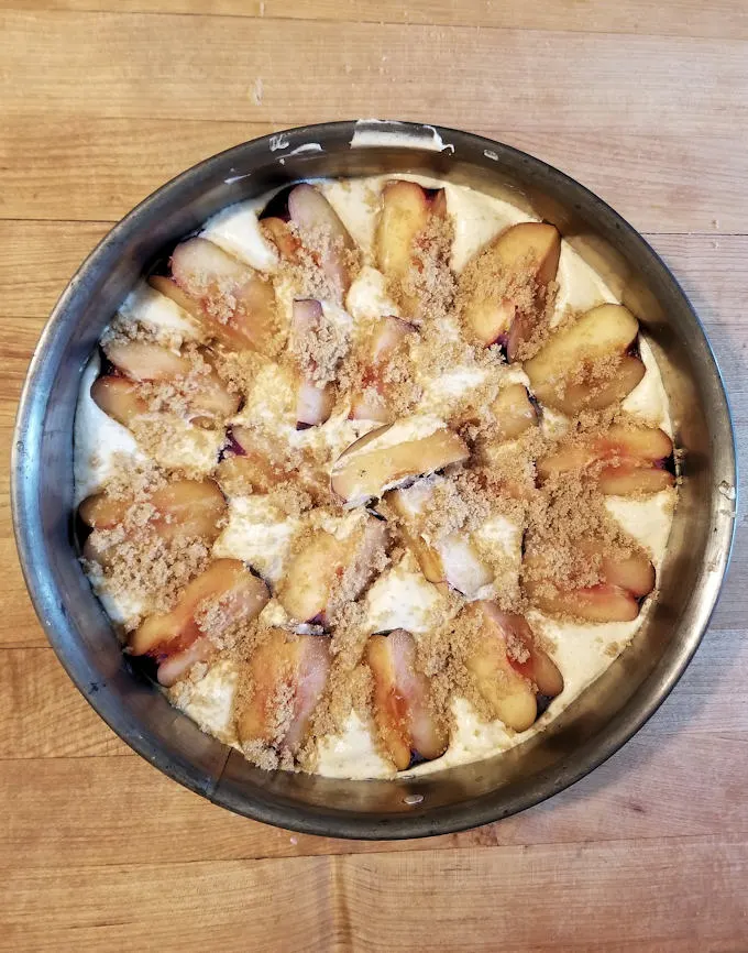 an unbaked plum cake