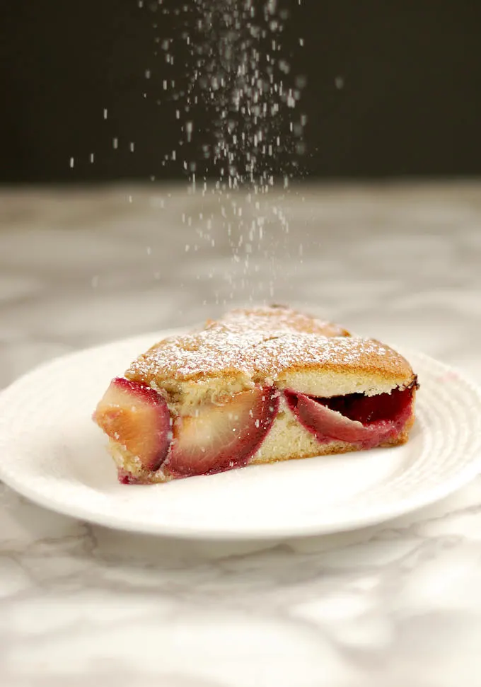 rustic plum cake with cardamom sprinkled with sugar