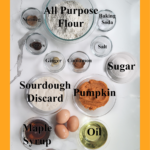 ingredients for sourdough discard pumpkin bread in glass bowls.
