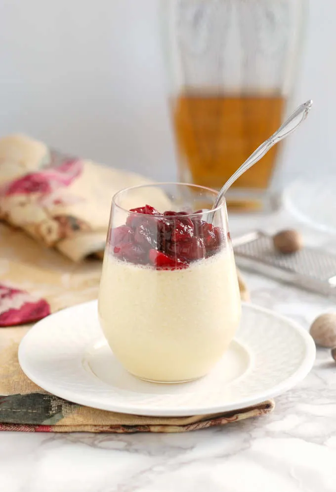 eggnog panna cotta served in a wine glass