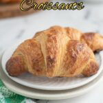 a pinterest image for sourdough croissants with text overlay.