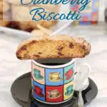 a pinterest image for ginger cranberry biscotti with text overlay