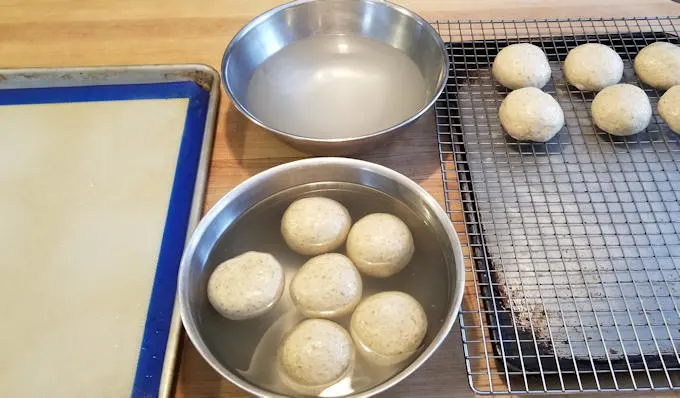 set up for soaking rye pretzel rolls