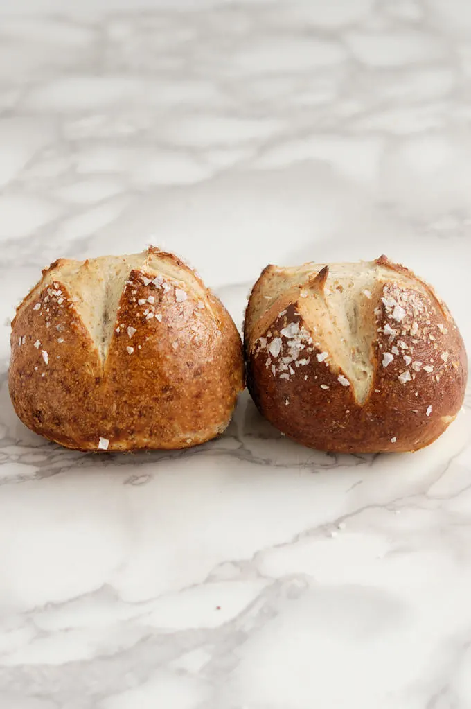 two malt and rye pretzel rolls 