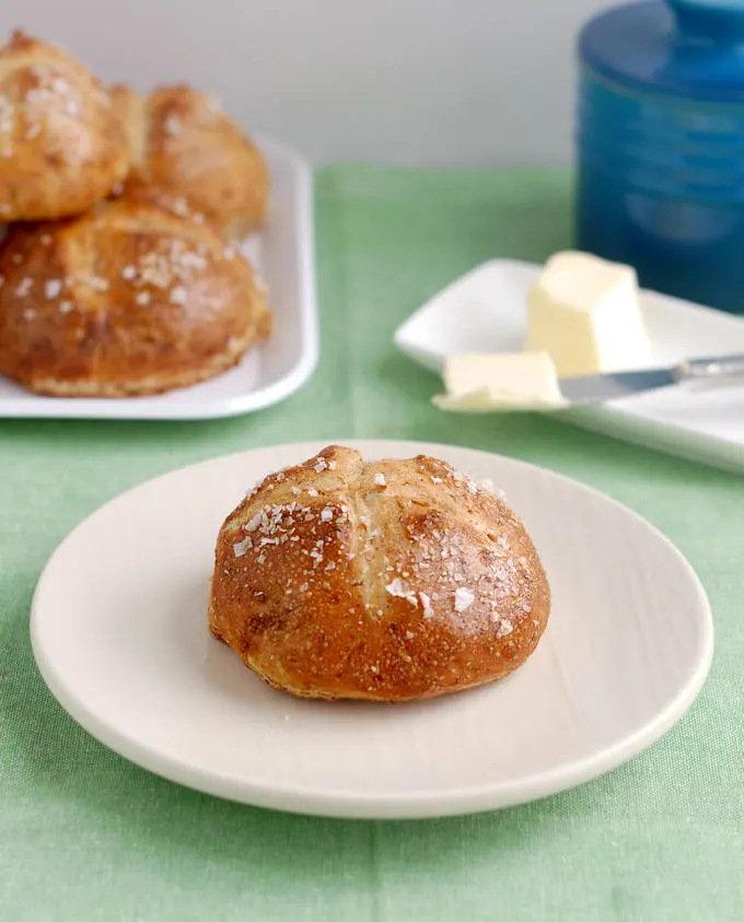 malt and rye pretzel roll on a plate