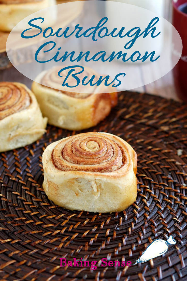 Does anything in the world smell as good as freshly baked Cinnamon Buns? A long slow rise gives these Sourdough Cinnamon Buns an extra special flavor & texture. The warm buns are topped with cream cheese frosting for an indulgent breakfast or brunch treat, and there's a bonus "sticky bun" layer at the bottom. #sourdough #cinnamon buns #recipe #overnight #homemade #scratch #cream cheese frosting