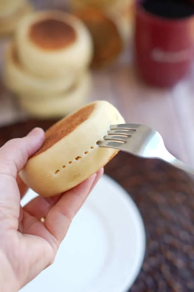 split sourdough english muffins with a fork