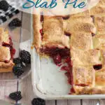 A pinterest image showing a blackberry slab pie with a piece cut out